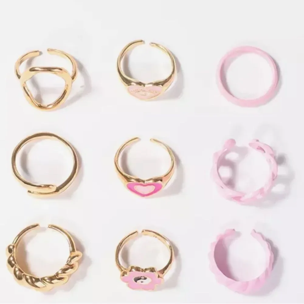 ‎9 PIECE PINK RESIZABLE RING SET